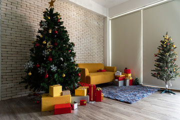 The  living room in the loft is decorated with a Christmas tree. Square. Concept of Happy Christmas, New Year, holiday, background.