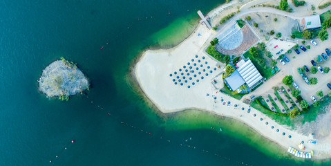 Aerial top down view of Mina de Sao Domingos, Tapada Grande River Beach lagoon, famous tourist destination, Alentejo, Portugal.