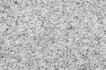 Natural colored marble chips background texture. Decorative marble plaster for indoor and outdoor use. Coarse-grained stone. quartz sand