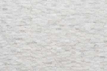 White modern decorative natural stone for inside. Panel wall small marble brick background texture, decorative pattern quartz stone mosaic. interior decoration of the room