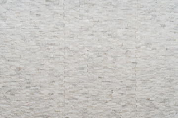 White modern decorative natural stone for inside. Panel wall small marble brick background texture, decorative pattern quartz stone mosaic. interior decoration of the room