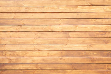 Fototapeta premium Light brown wooden texture with horizontal planks, desk or wall surface