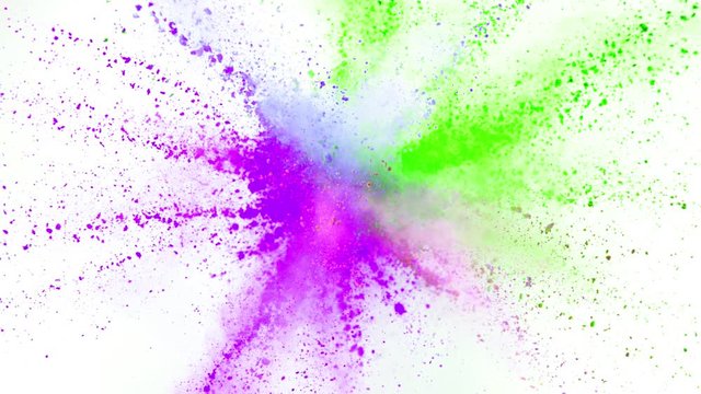 Colorful powder exploding on white background in super slow motion, close-up.