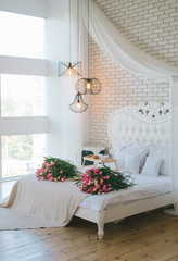 The interior of the bedroom in a classic light style