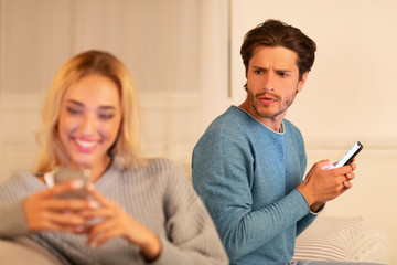 Husband Noticed Wife Texting On Cellphone Suspecting Infidelity At Home