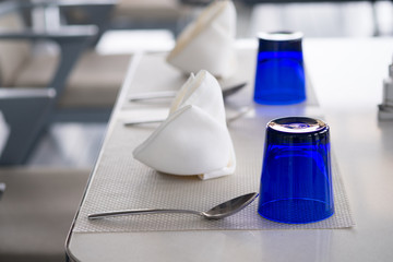 Beautifully set dining table in a restaurant.