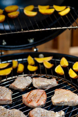 grilled tuna with potatoes on garden grill