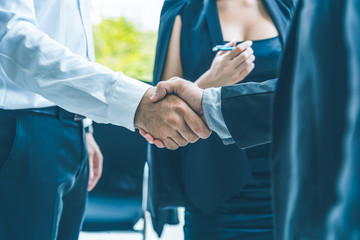 Businessman hand shake after the new project meeting. Business agreement concept.