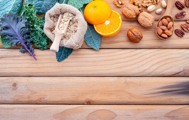 Ingredients for the healthy foods selection. The concept of healthy food set up on shabby wooden background.