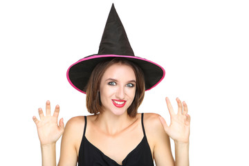 Happy young woman in black halloween costume on white background