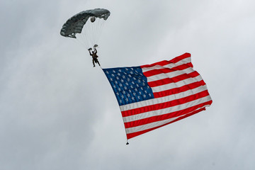 Parachuting American Soldier with American Flag