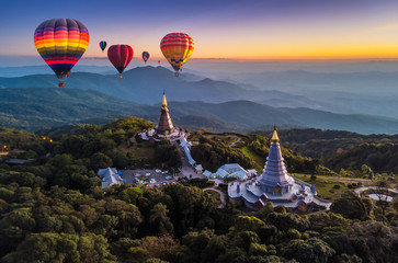 Colorful hot air balloons flying over Doi Inthanon National Park in Chiang Mai, Thailand. .