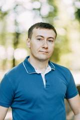  Portrait of a guy in a restaurant. Handsome man in the Park.