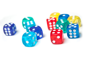 Closeup of colorful dices on white background