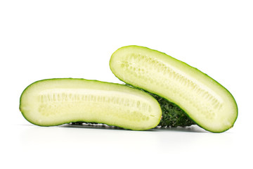 Group of two halves of meaty fresh pickling cucumber isolated on white background