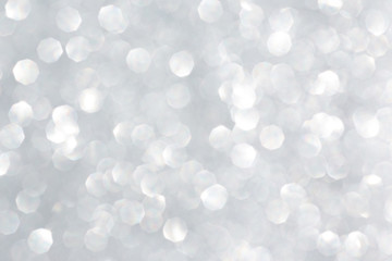 Abstract silver glitter background. Sparkle silver bokeh christmas background.