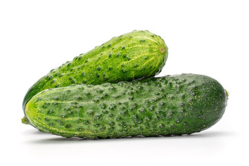 Group of two whole fresh pickling cucumber isolated on white background