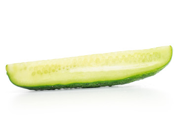 One slice of juicy fresh green pickling cucumber isolated on white background