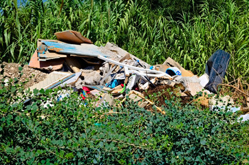 Illegal garbage dump in the nature