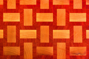 Wood Board surface background texture. The red wood grunge plank has a weave effect.