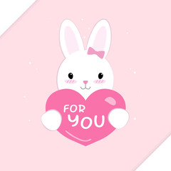 White rabbit which is holding heart for Valentine's day.