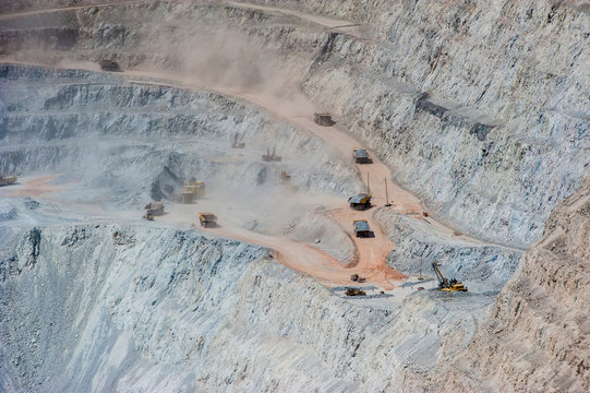 Big trucks and machinery at Chuquicamata, world's biggest open pit copper mine, Calama, Chile. Mining Operations at open pit Copper Mine near Calama, Northern Chile. 