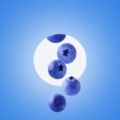 Fresh falling blueberries isolated on trendy colored background