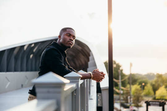 Man contemplating outdoors