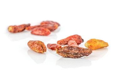 Lot of whole dry red chili pepper peperoncino isolated on white background