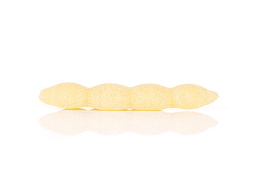 One whole uncooked pasta cavatelli isolated on white background