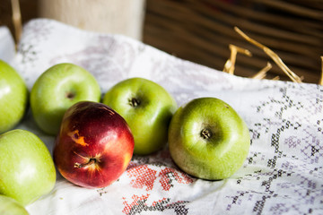 Organic apples in basket . Fresh apples in nature