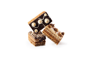 Sweet cookie cake cupcake with vanilla cream and shkoladom. On a white background isolate. A treat for any holiday.