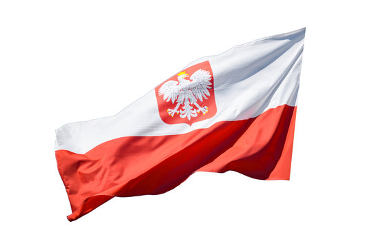 The state flag of Poland with the emblem of the Republic of Poland, waving in the wind on the left, isolated on white background with a clipping path.