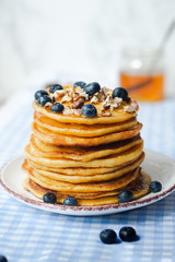 fluffy pancakes with honey and berries