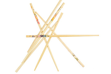 Lot of whole colorful asian brown chopsticks flatlay isolated on white background