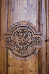 Valletta, Malta, August 2019. Antique door with a beautiful carved pattern.