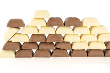 Lot of whole arranged fresh chocolate piece wall isolated on white background