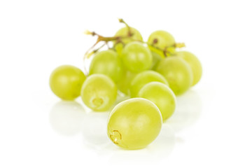 Lot of whole bright fresh green grape isolated on white background
