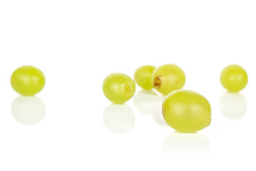 Lot of whole bright fresh green grape isolated on white background