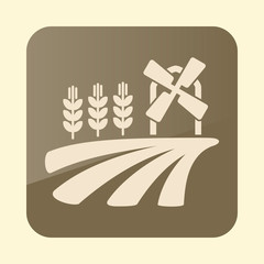 Field with a windmill and ears of wheat icon