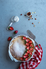 strawberry pie on white rustic background