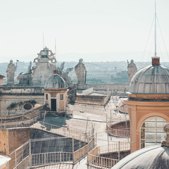 Detail of the St Peter's Basilica in Vatican City, Rome, Italy. Statues on the top of St Peter's...