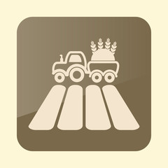 Tractor on field flat icon
