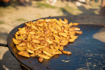 big pan fried potato outdoor picnic food picture 