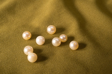 pearls in a yellow background-
