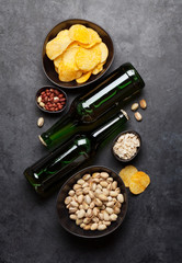 Bottled beer and snacks