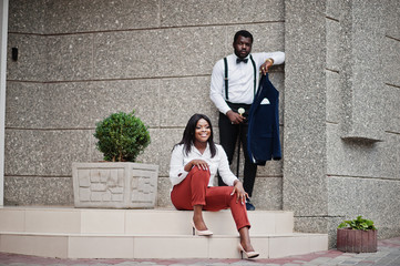 Stylish african american couple in formal wear. Romantic couple in love dating.