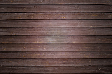 Old wooden wall painted in dark color