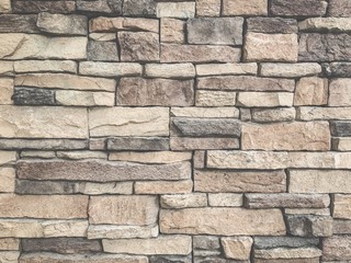 old hard rock brick wall.