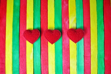 Old vintage with heart wood background.Reggae background.Green,red and yellow on oak wood.green,...